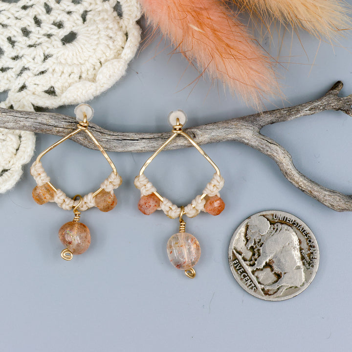 handmade gold fill and sunstone macrame earrings with a nickel for size comparison