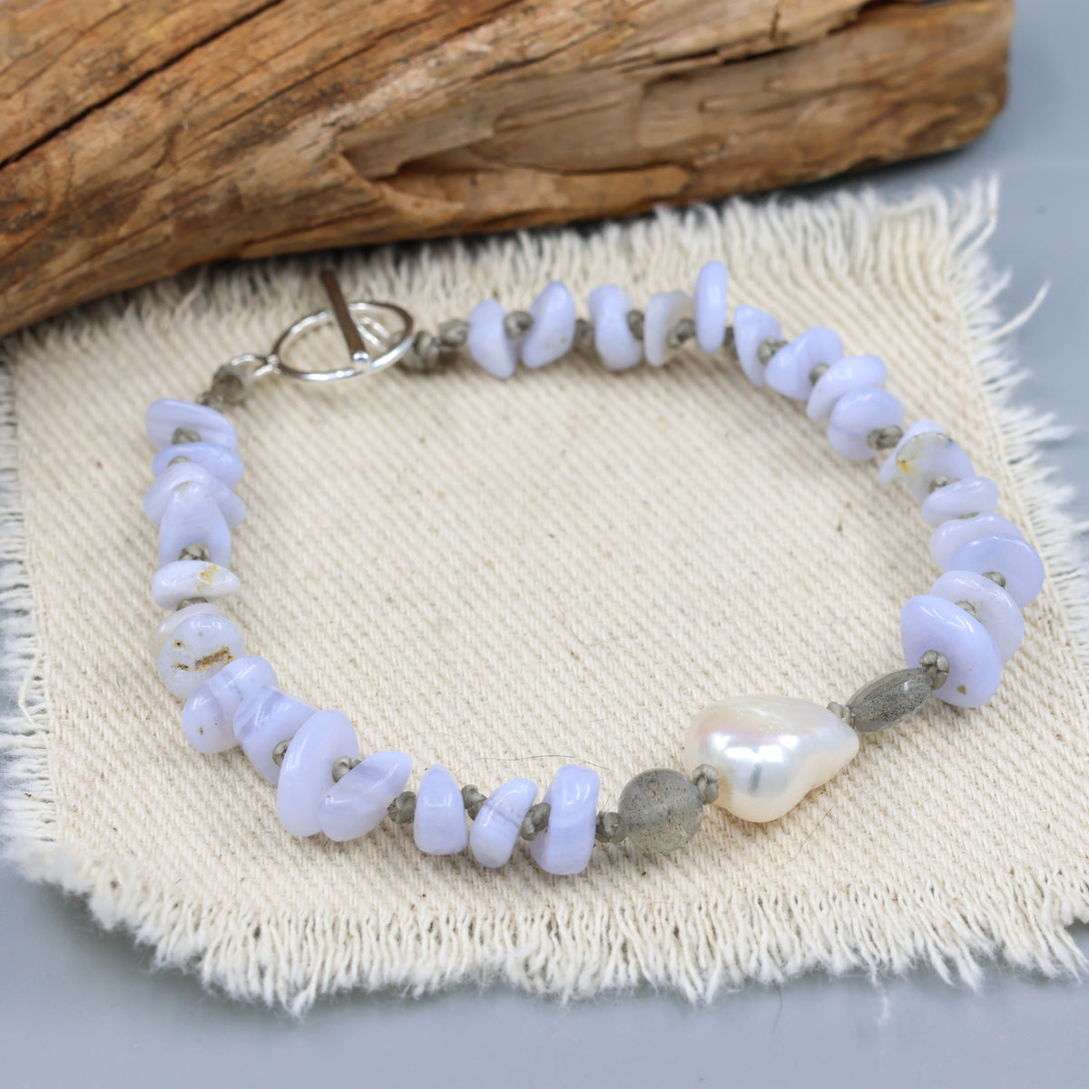 handknotted blue lace agate and freshwater pearl bracelet with a sterling silver clasp