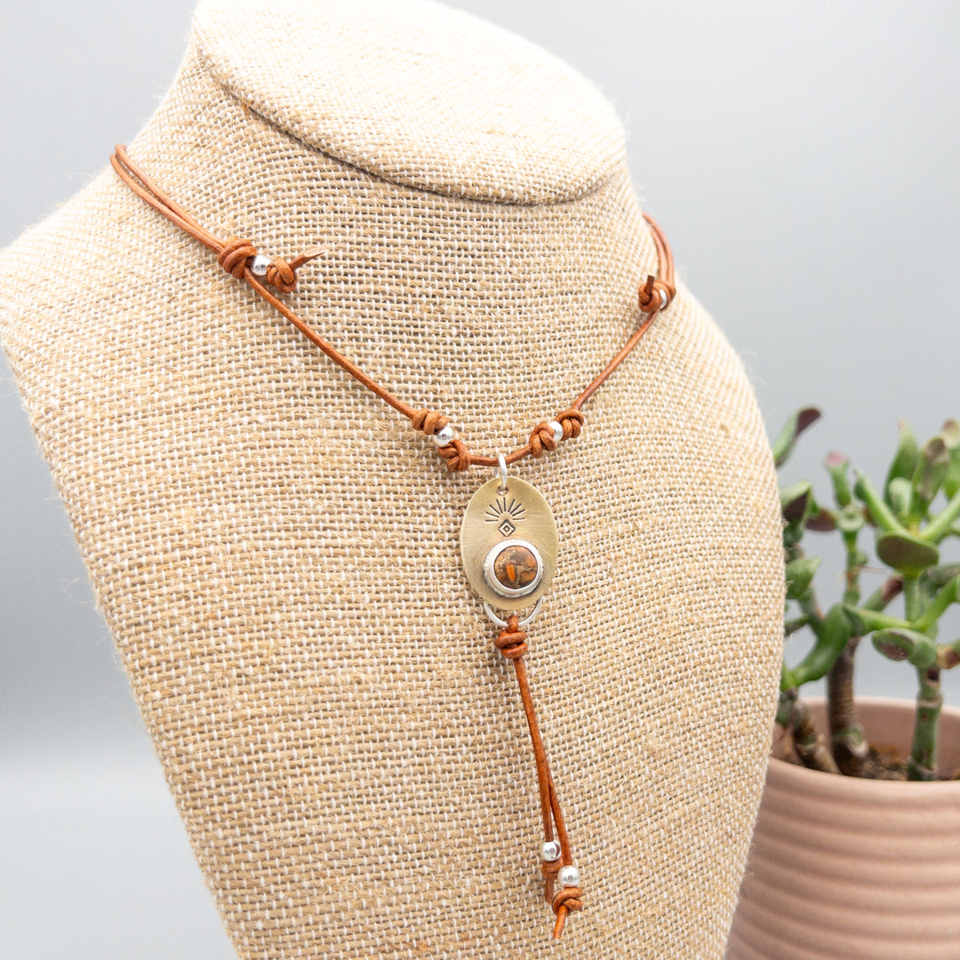 orange copper turquoise set in a brass pendant with sterling silver beads