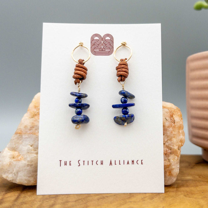 Lapis Lazuli drop earrings in 14k gold fill with natural leather on white card
