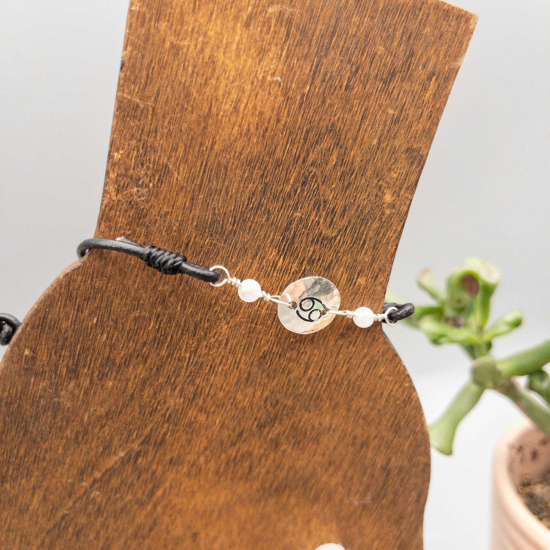 Cancer zodiac bracelet with moonstone beads and stamped sterling silver disc