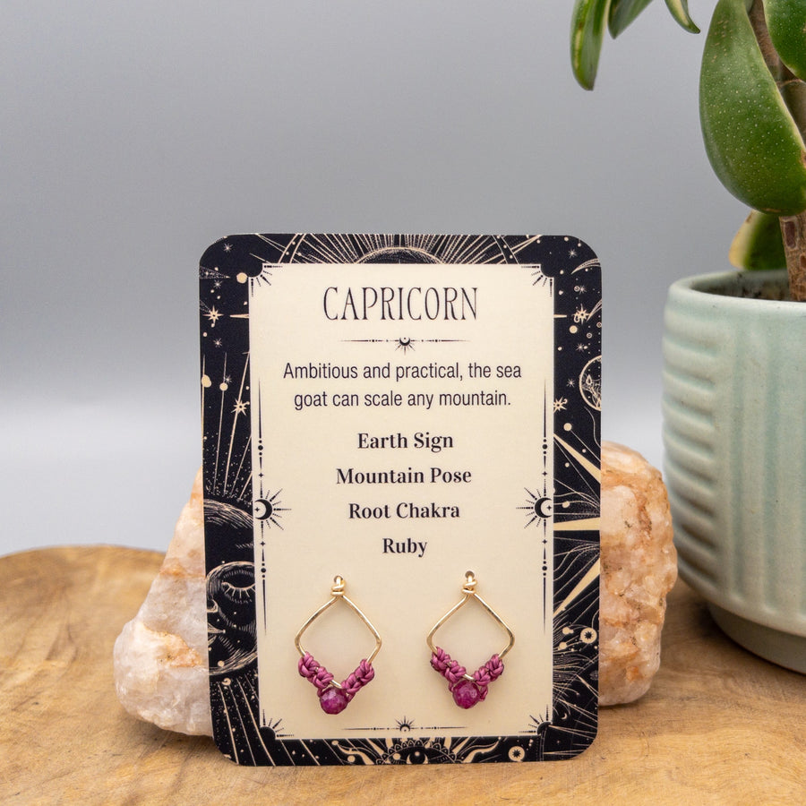 Capricorn ruby earrings gold filled on a gift card