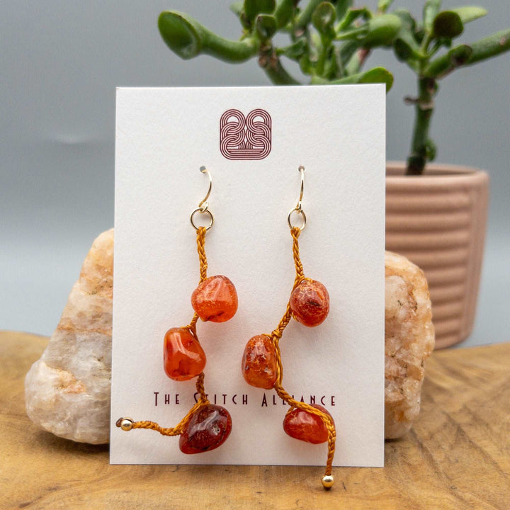 carnelian earrings with 14k gold fill ear wires on white background