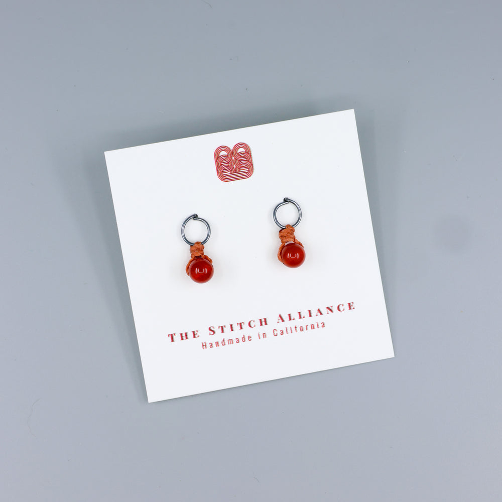 carnelian mini dangle earrings oxidized sterling handmade on a white card