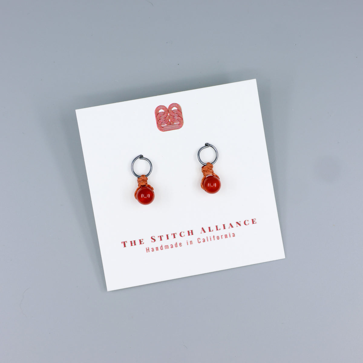 carnelian mini dangle earrings oxidized sterling handmade on a white card