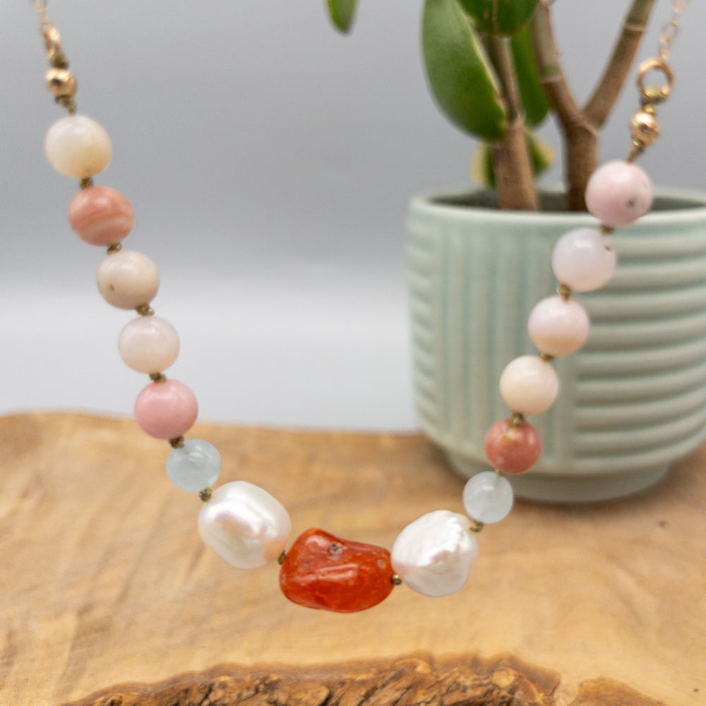 carnelian, freshwater pearl, aquamarine, and pink opal hand knotted necklace details