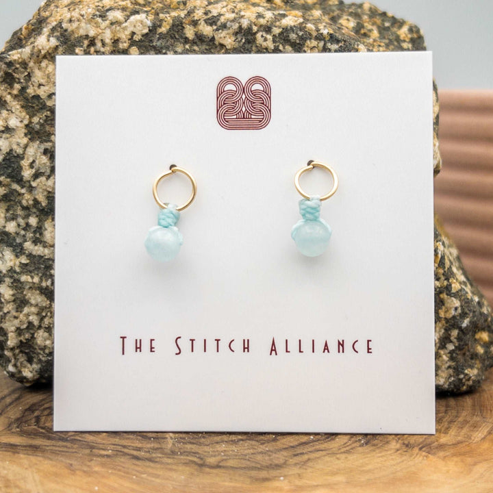 14k gold filled post style earrings with an aquamarine bead
