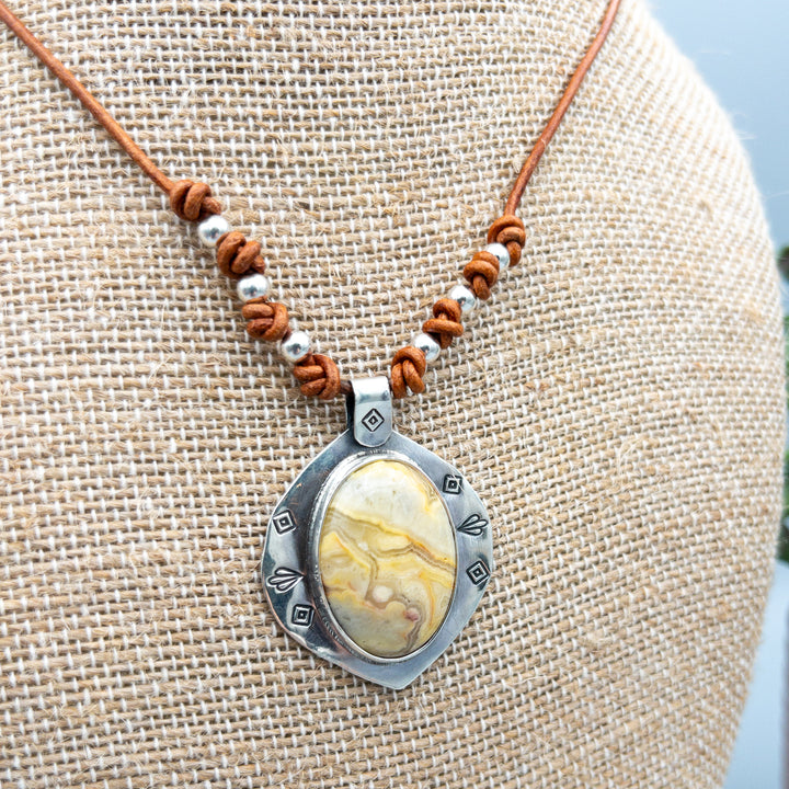 detail of Crazy lace agate, sterling silver, leather necklace