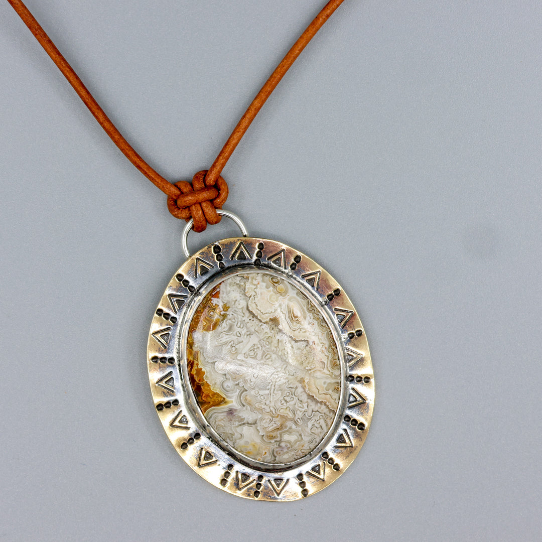 handmade one of a kind crazy lace agate brass necklace on leather cord