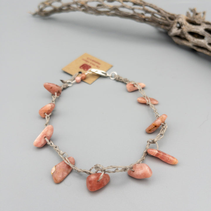 rhodonite bead crocket anklet with sterling silver clasp on a gray background