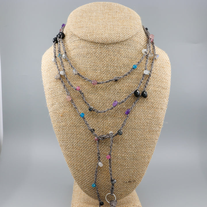 crochet lariatt necklace with tourmaline, amethyst, strawberry quartz, moonstone, and labradorite gemstones
