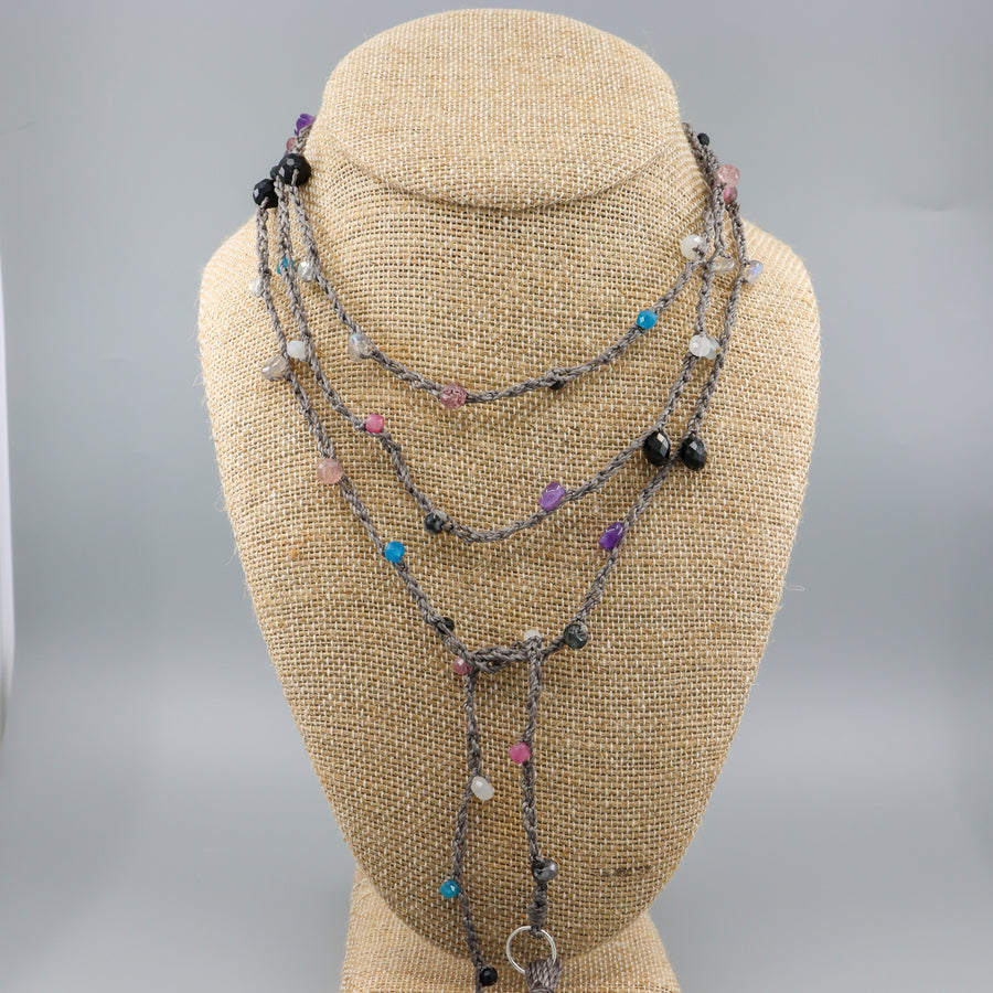 crochet lariatt necklace with tourmaline, amethyst, strawberry quartz, moonstone, and labradorite gemstones