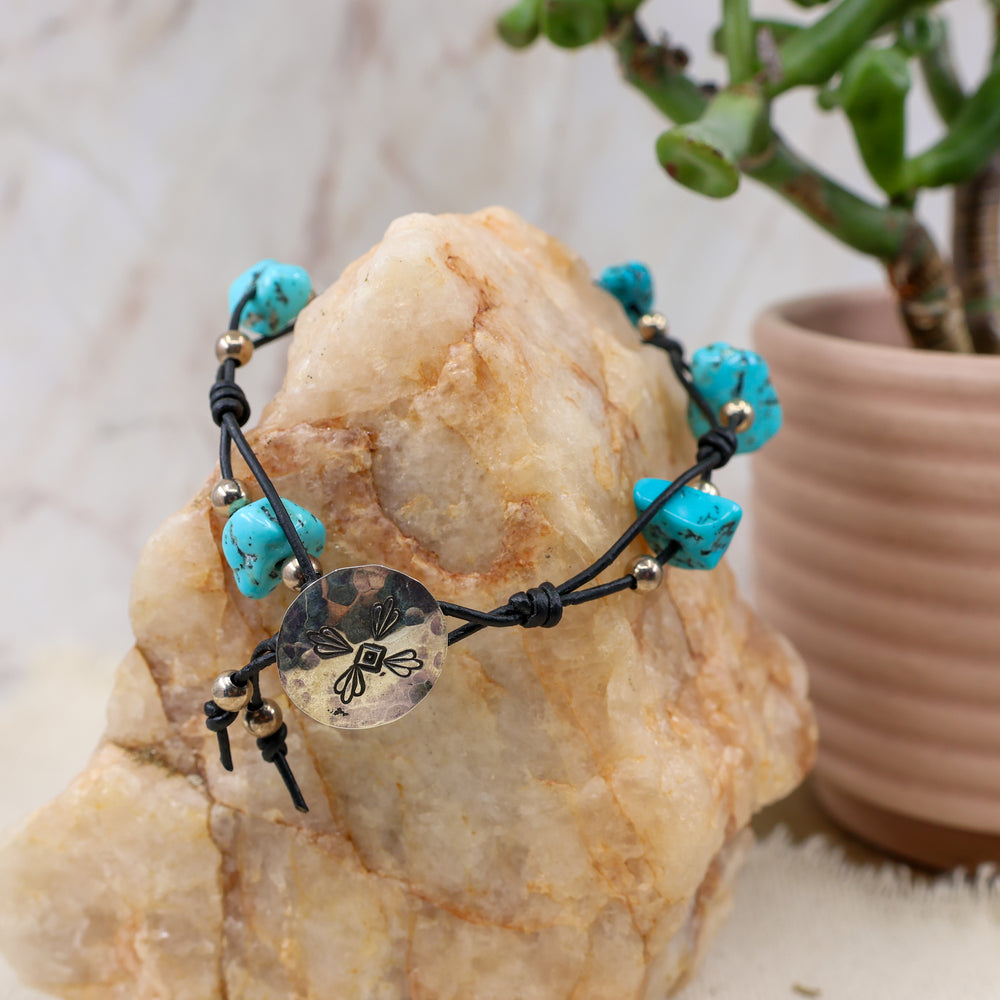 Turquoise and black leather bracelet with handmade sterling silver button clasp