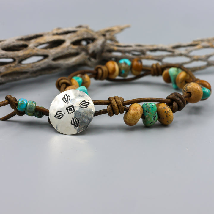 detail view handmade jasper and turquoise leather bracelet with sterling silver button clasp