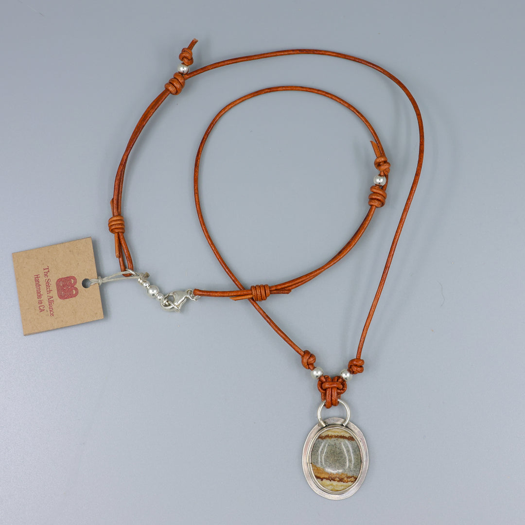 full view of jasper sterling silver pendant on leather cord