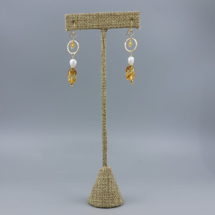 handmade gold fill earrings with citrine and freshwater pearl beads on a linen hanger