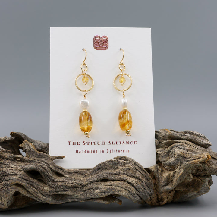 handmade gold fill earrings with citrine and freshwater pearl beads on a white card