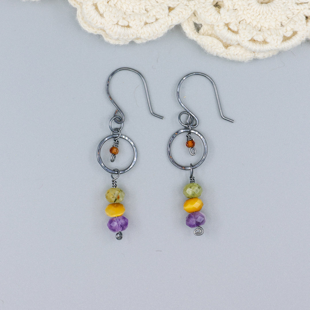 handmade oxidized sterling silver, amethyst, golden tigers eye, green garnet, and hessonite dangle earrings
