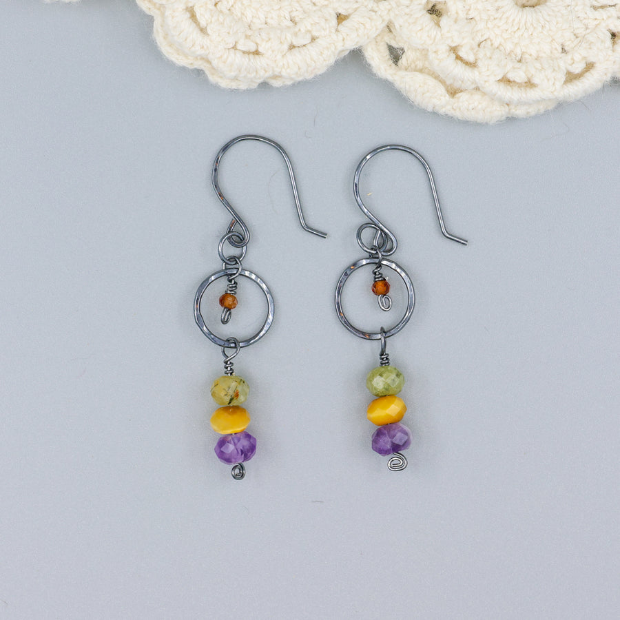 handmade oxidized sterling silver, amethyst, golden tigers eye, green garnet, and hessonite dangle earrings
