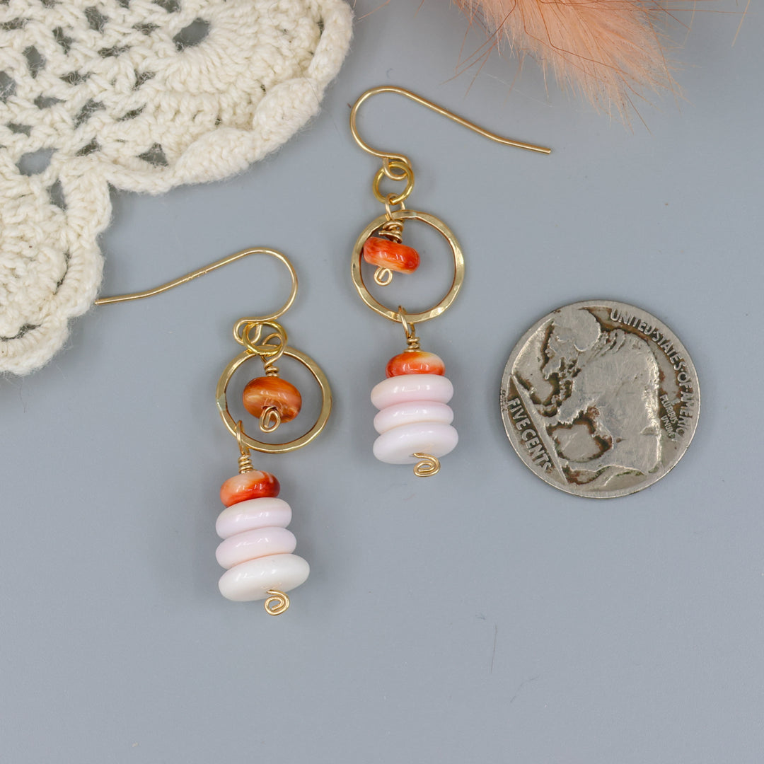 queen conch and spiny oyster gold fill earrings with a nickel for size comparison