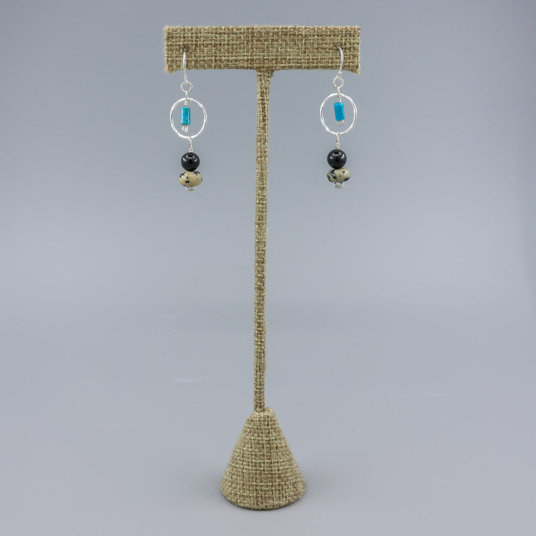handmade dalmation jasper, spinel, and turquoise sterling silver dangel earrings on a linen hanger