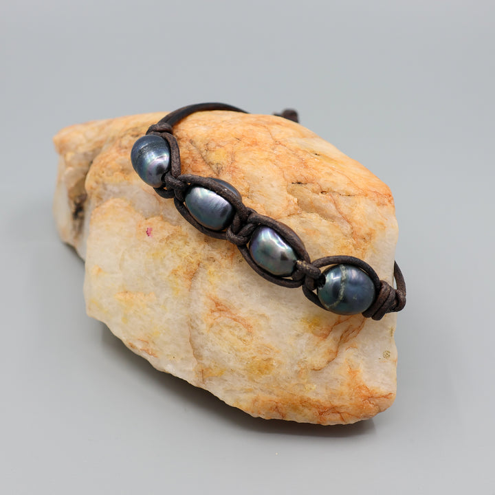 peacock pearl and black leather bracelet