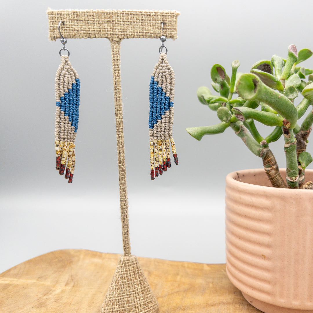 blue, tan, and red handwoven macrame earrings with seed bead fringe