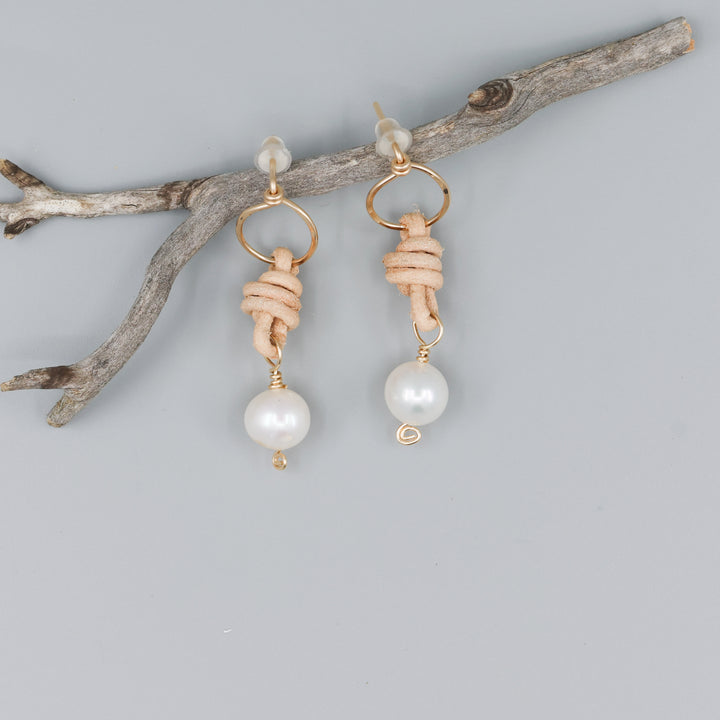 freshwater pearl leather 14k gold fill handmade earrings lying flat