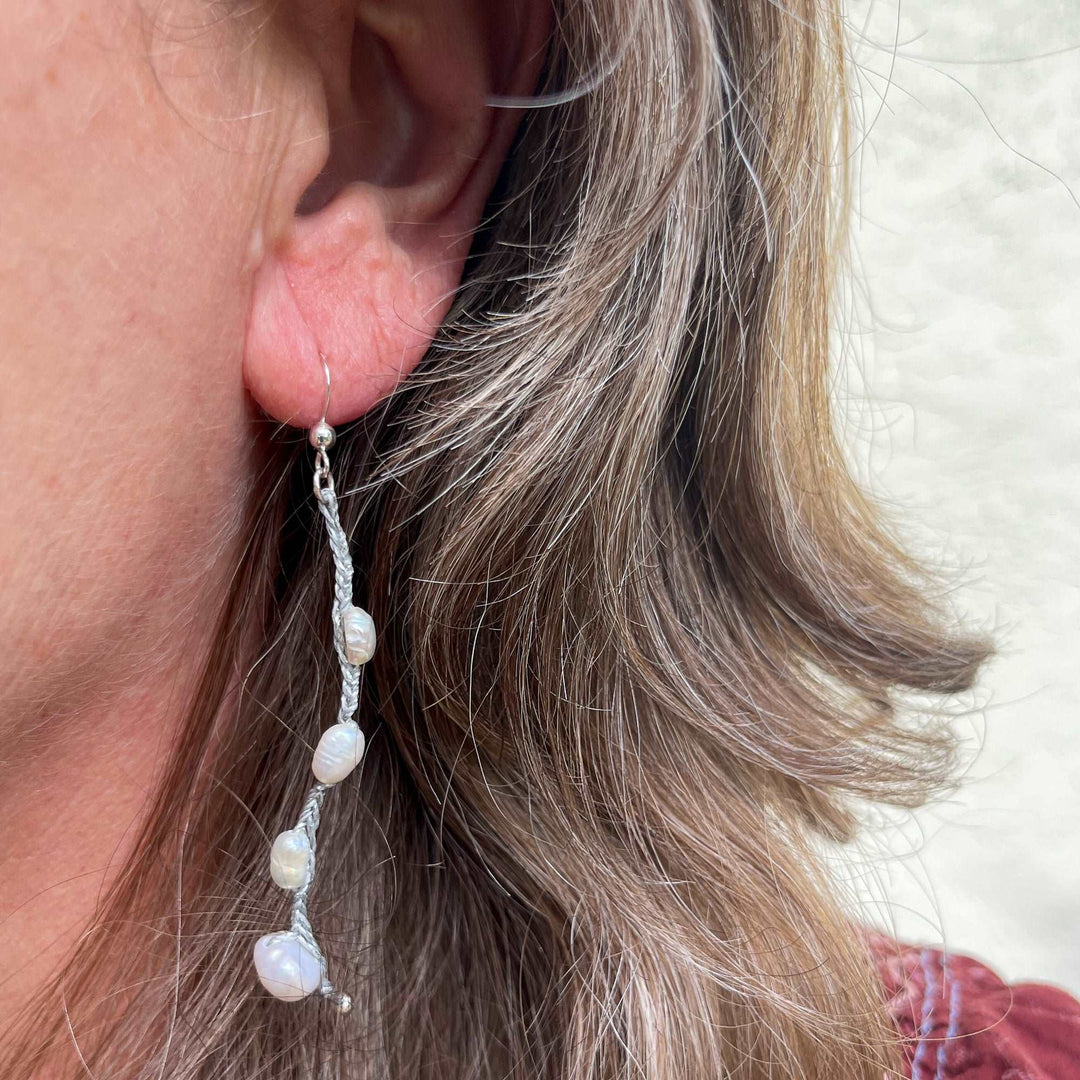 freshwater pearl dangle earrings sterling silver on model