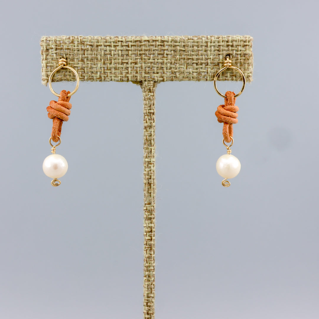 handmade freshwater pearl, leather, and gold earrings