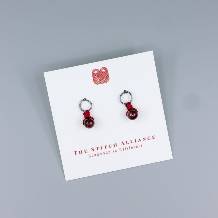 garnet mini dangle earrings oxidized sterling silver handmade on a white card