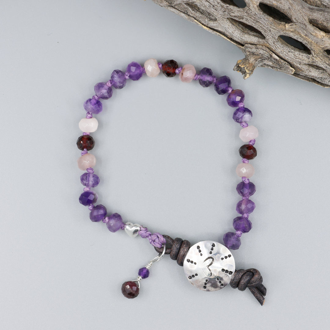 amethyst, rose quartz, and garnet beaded bracelet  with heart stamped button