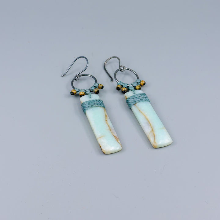 sedona inspired amazonite, sterling silver, macrame earrings on gray background