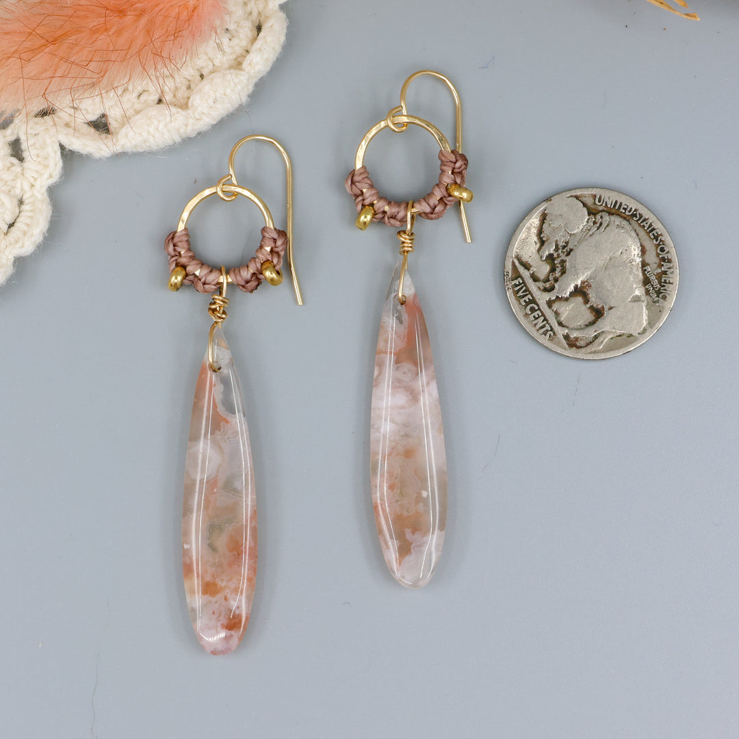 cherry blossom agate handmade macrame hoop earrings in gold fill with a nickel for size comparison