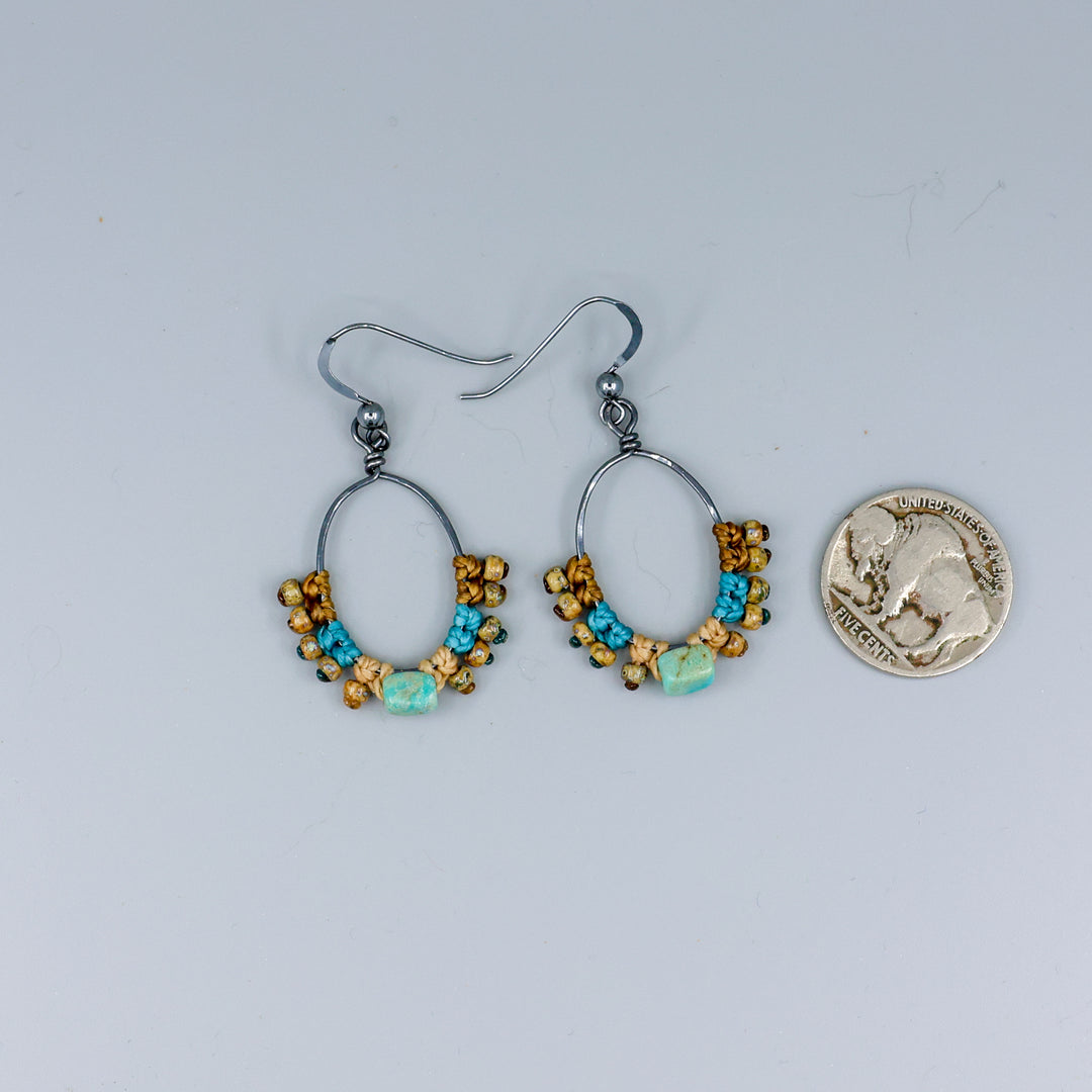 turquoise macrame hoop earrings with coin for size comparison