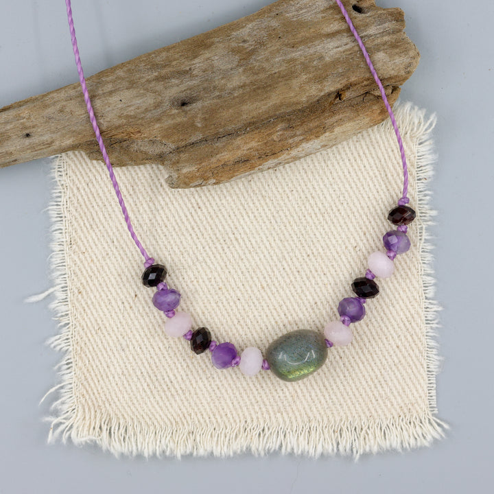 handknotted labradorite, morganite, amethyst, and garnet necklace with purple cord