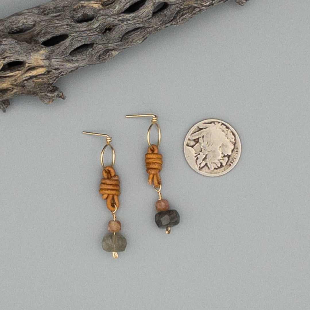 Labradorite, sunstone, leather and gold fill drop earrings with a nickel for size comparison
