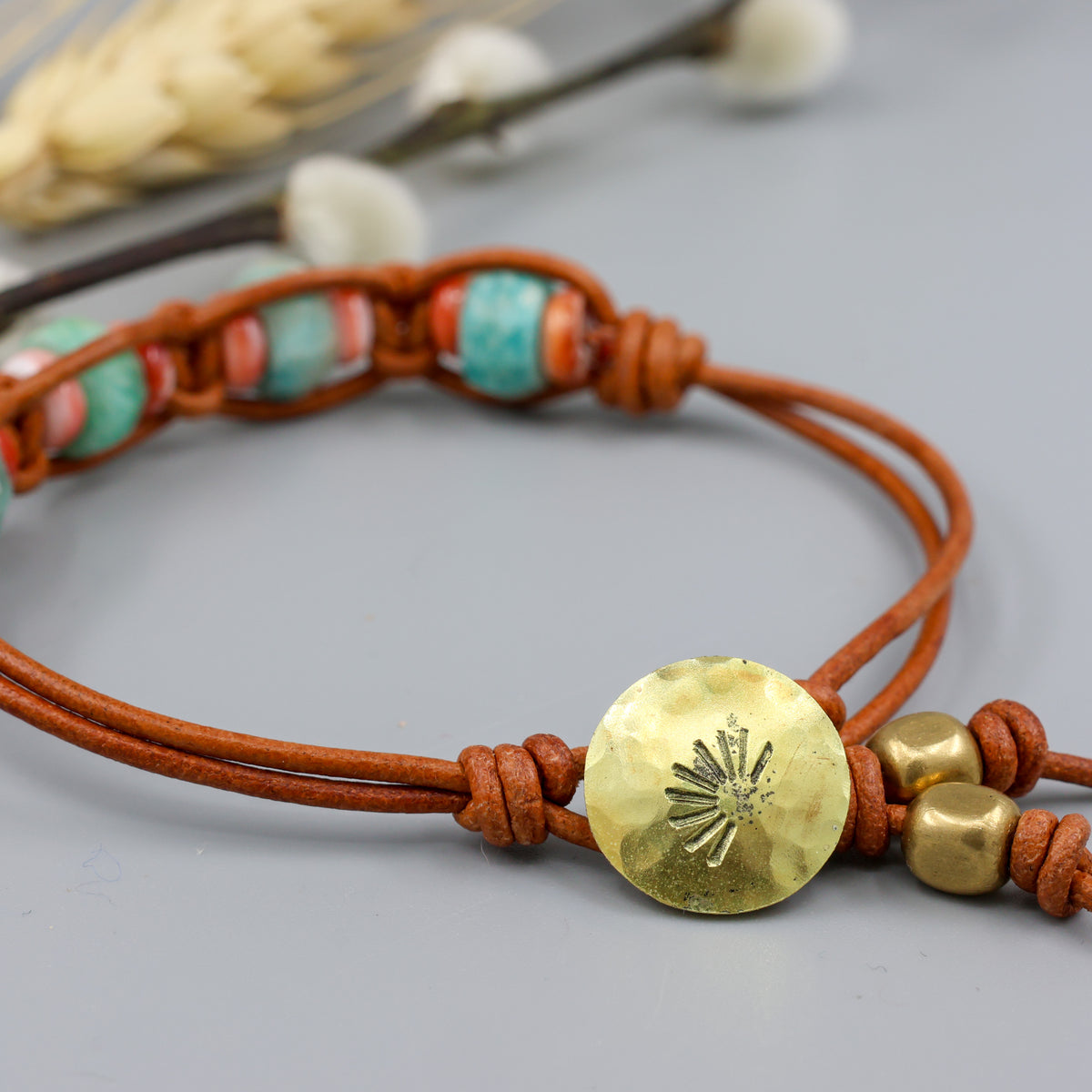 handmade amazonite, spiny oyster, leather bracelet with setting sun brass button closure