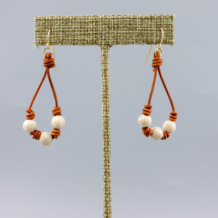 southwest inspired leather and river stone knotted hoop earrings with gold fill ear wires