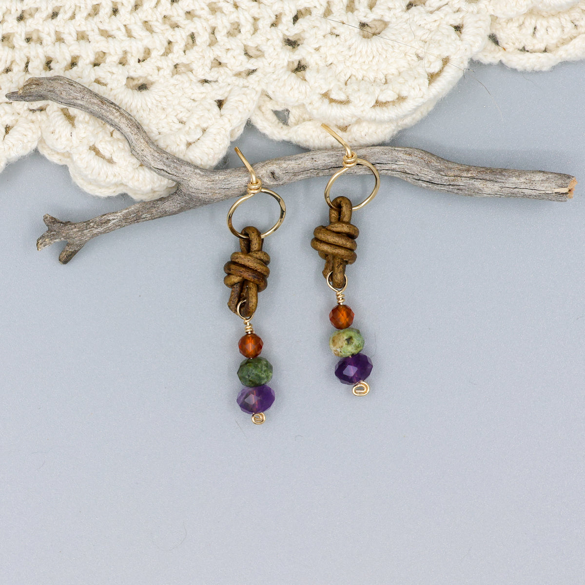 handmade amethyst, green garnet, and hessonite leather and gold fill earrings