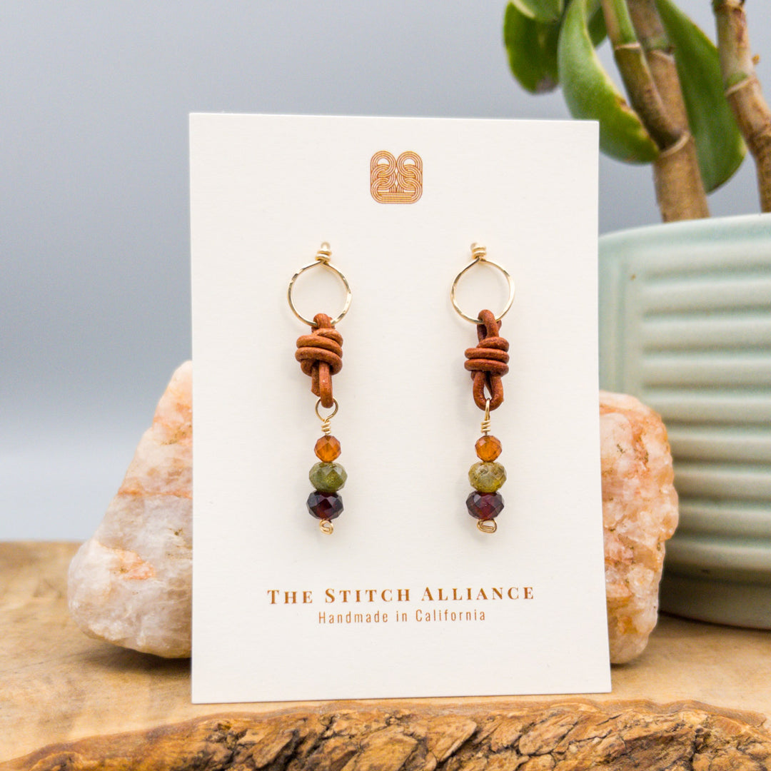 garnet, green garnet, and hessonite gold filled and leather earrings