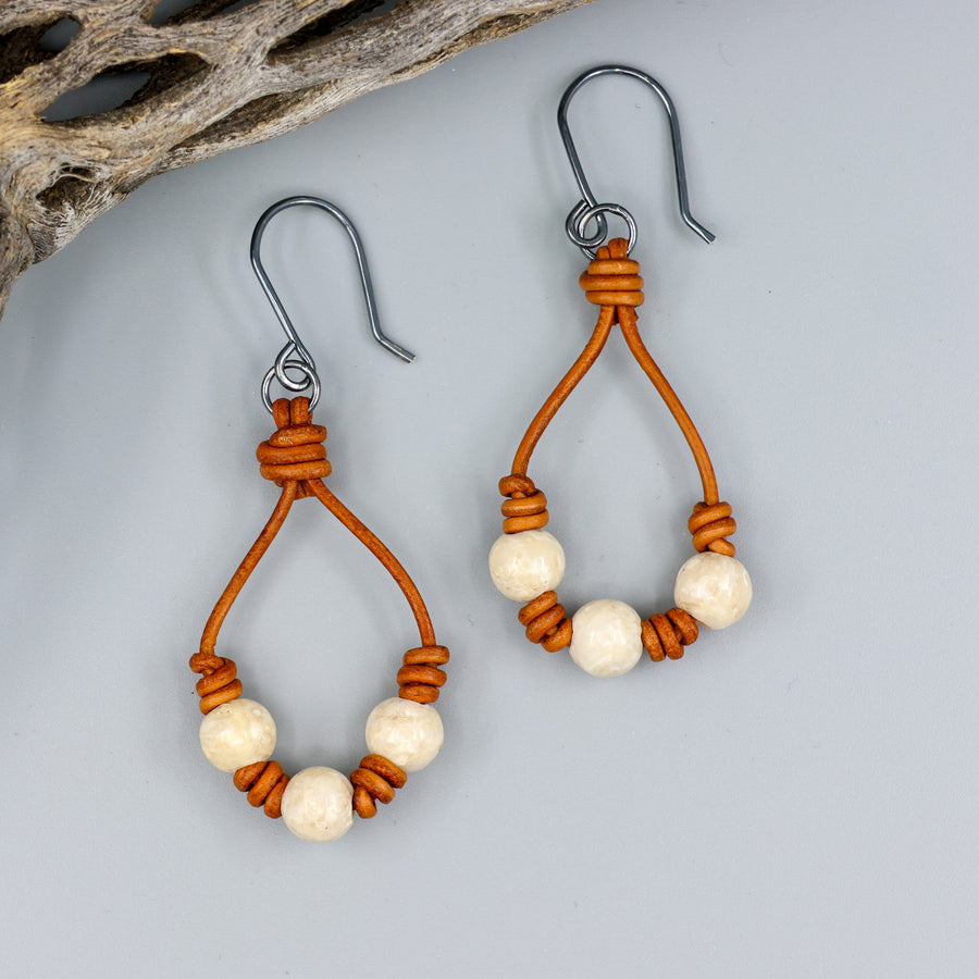 handmade southwest inspired leather and river stone hoop earrings with oxidized sterling ear wires