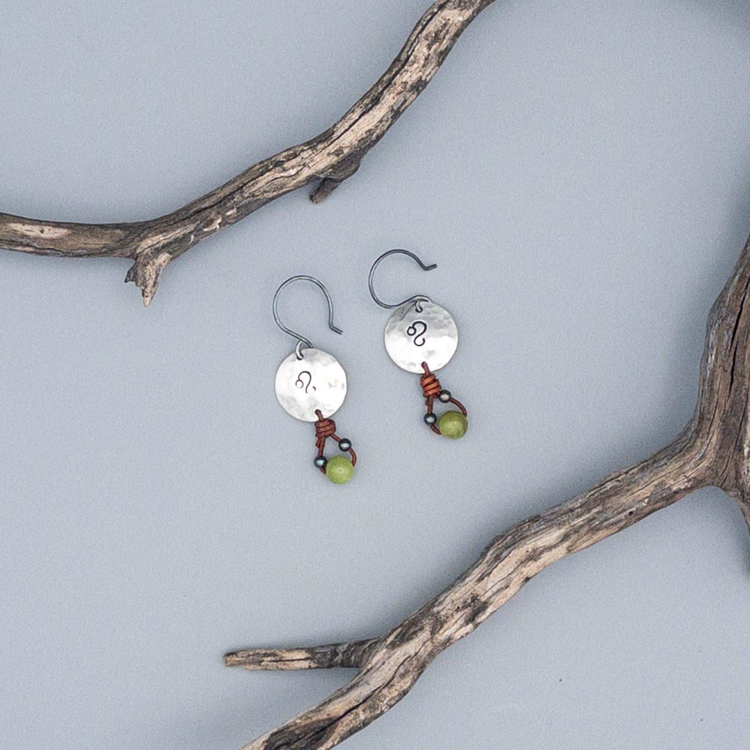 Handcrafted Leo sign stamped sterling silver earrings with peridot beads