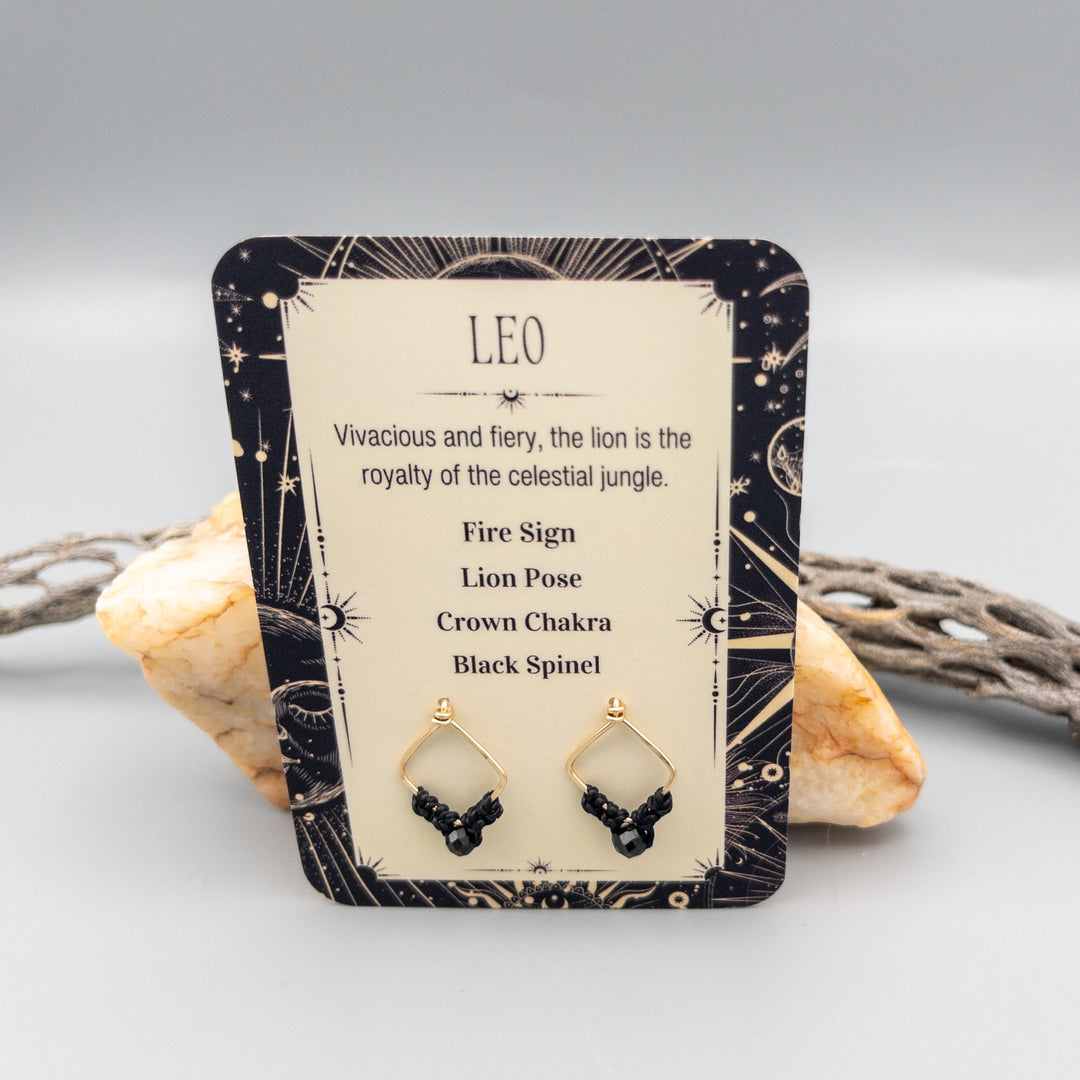 Leo black spinel gold filled earrings on card