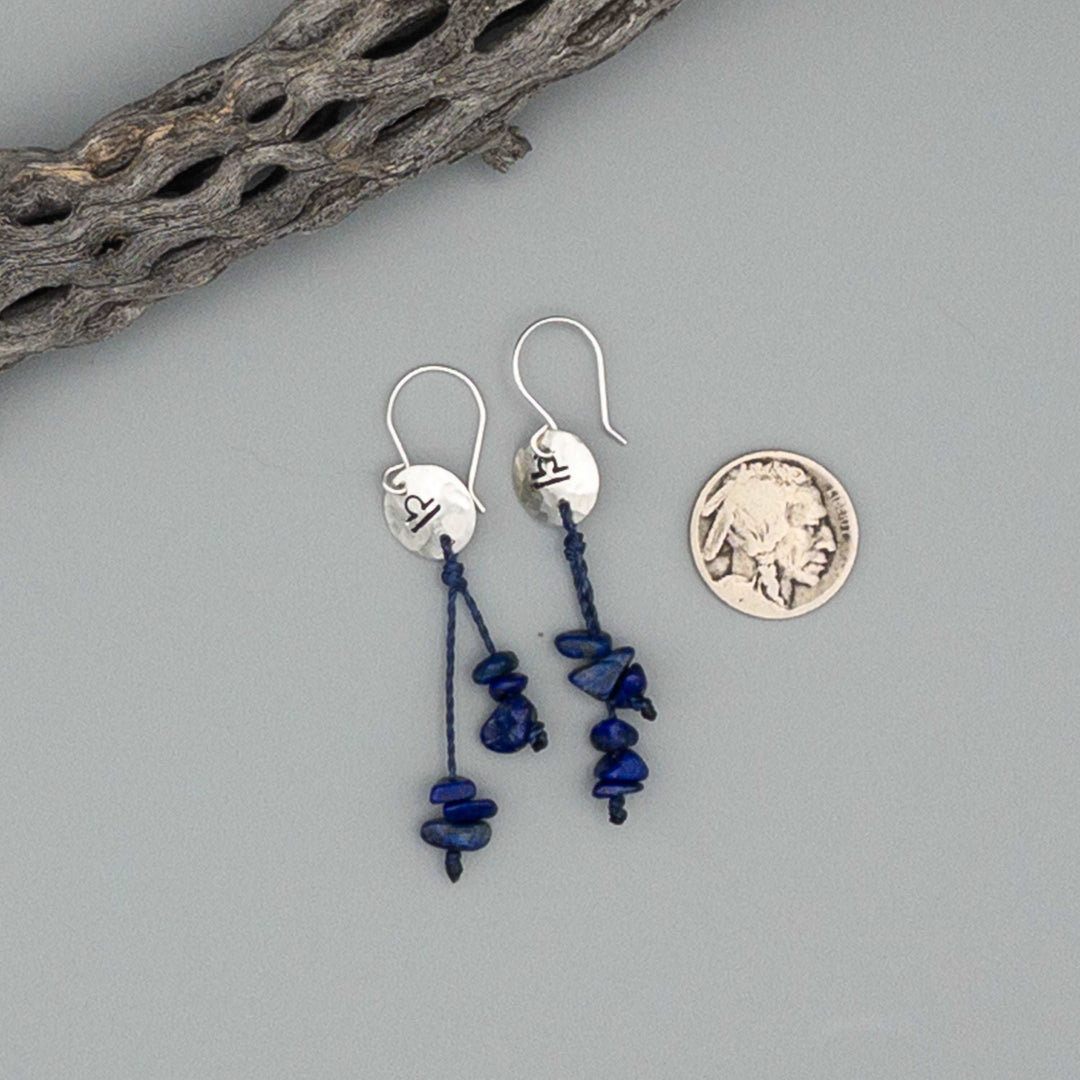 Libra zodiac earrings hand stamped sterling silver with lapis lazuli beads with a nickle for size comparison