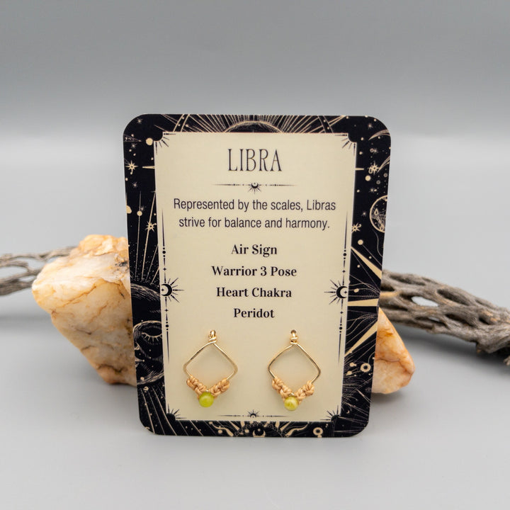 Libra gold filled peridot earrings front of card