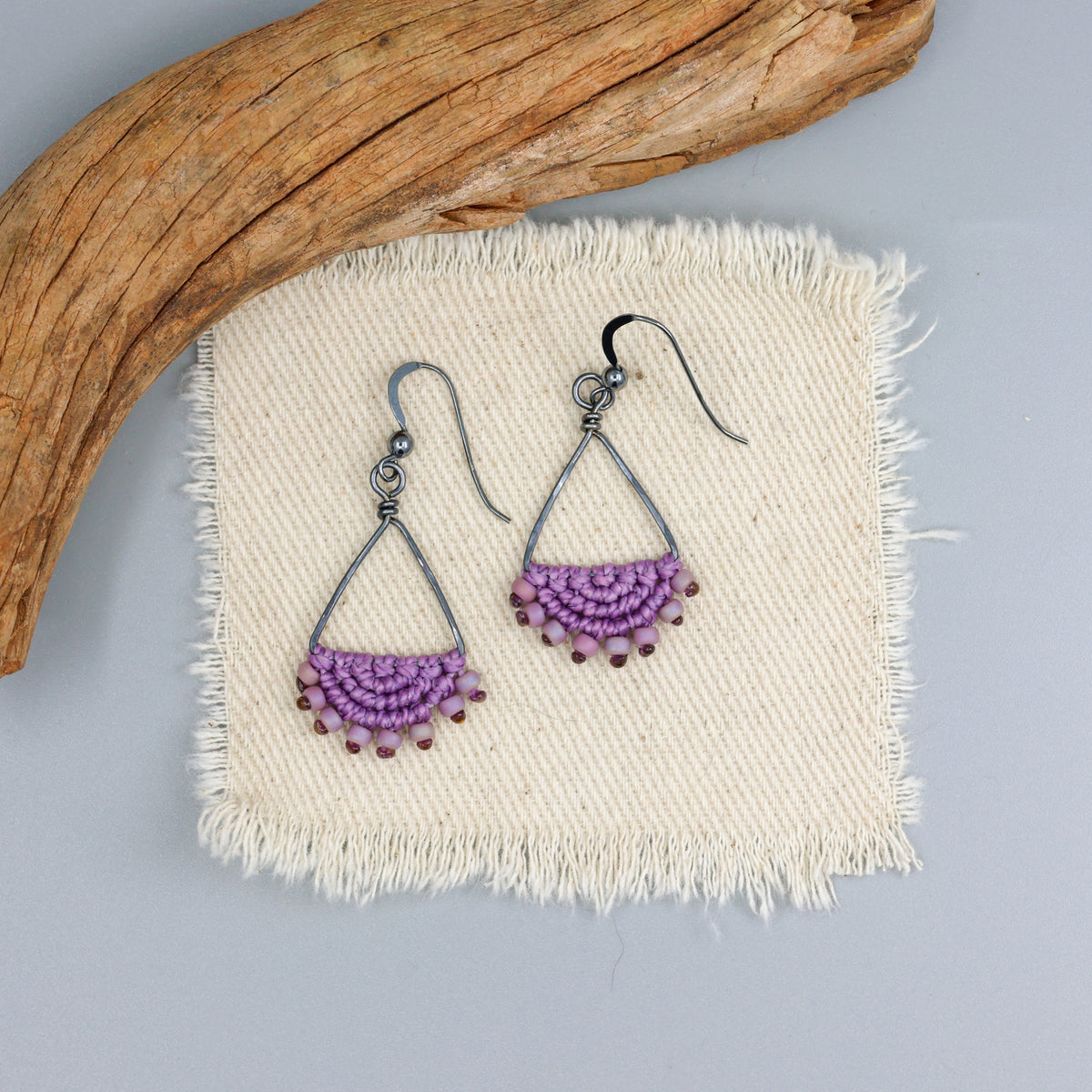 handmade purple macrame triangle hoop earrings in oxidized sterling silver