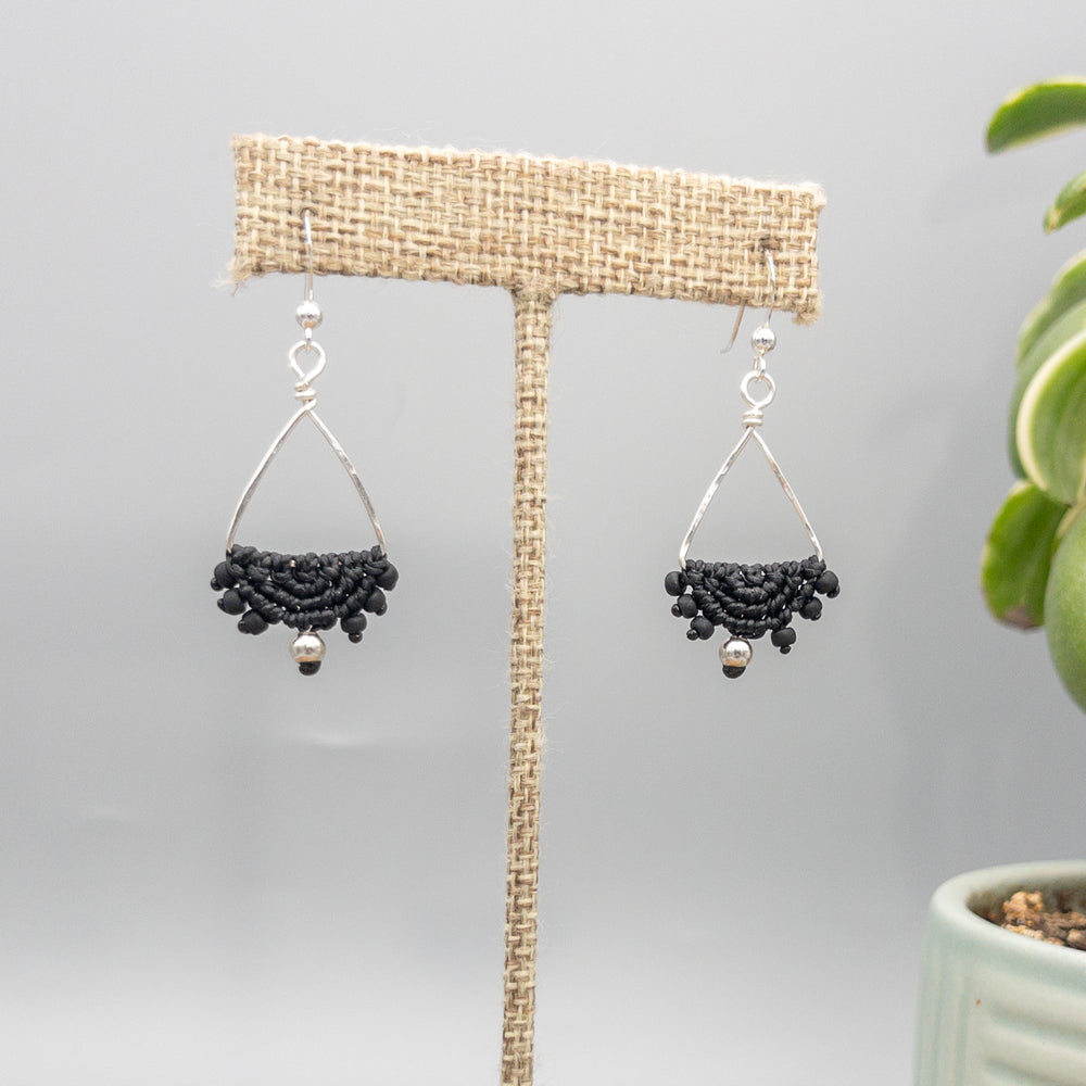 handmade sterling silver triangle hoop earrings with black macrame half moon