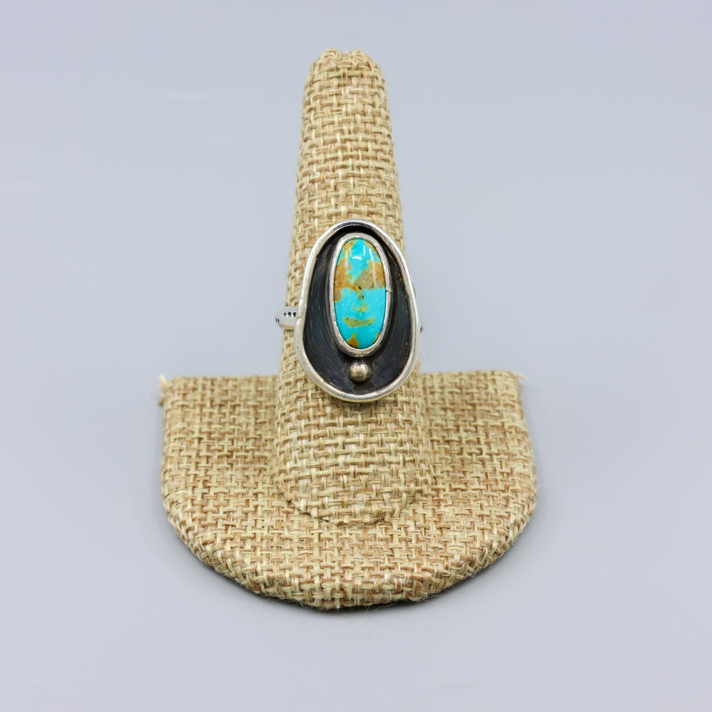 turquoisde shadow box ring handmade one of a kind on a linen hanger