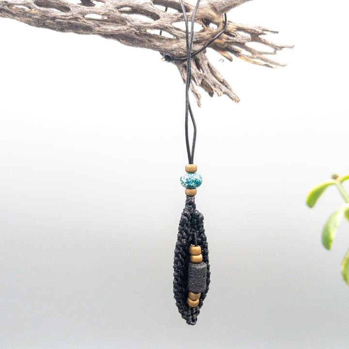 back of black macrame feather, small